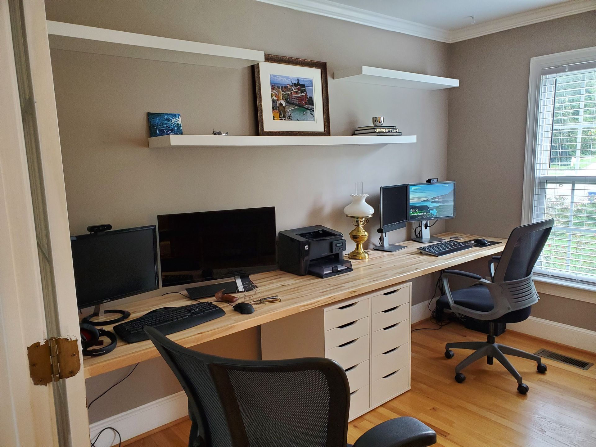 Side view of the completed built-in desk in use